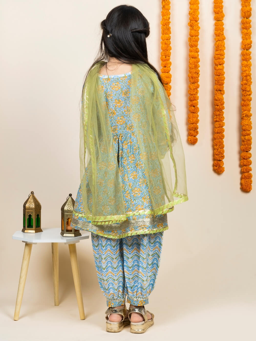 Front Open Peplum Top paired with Afghani Salwar