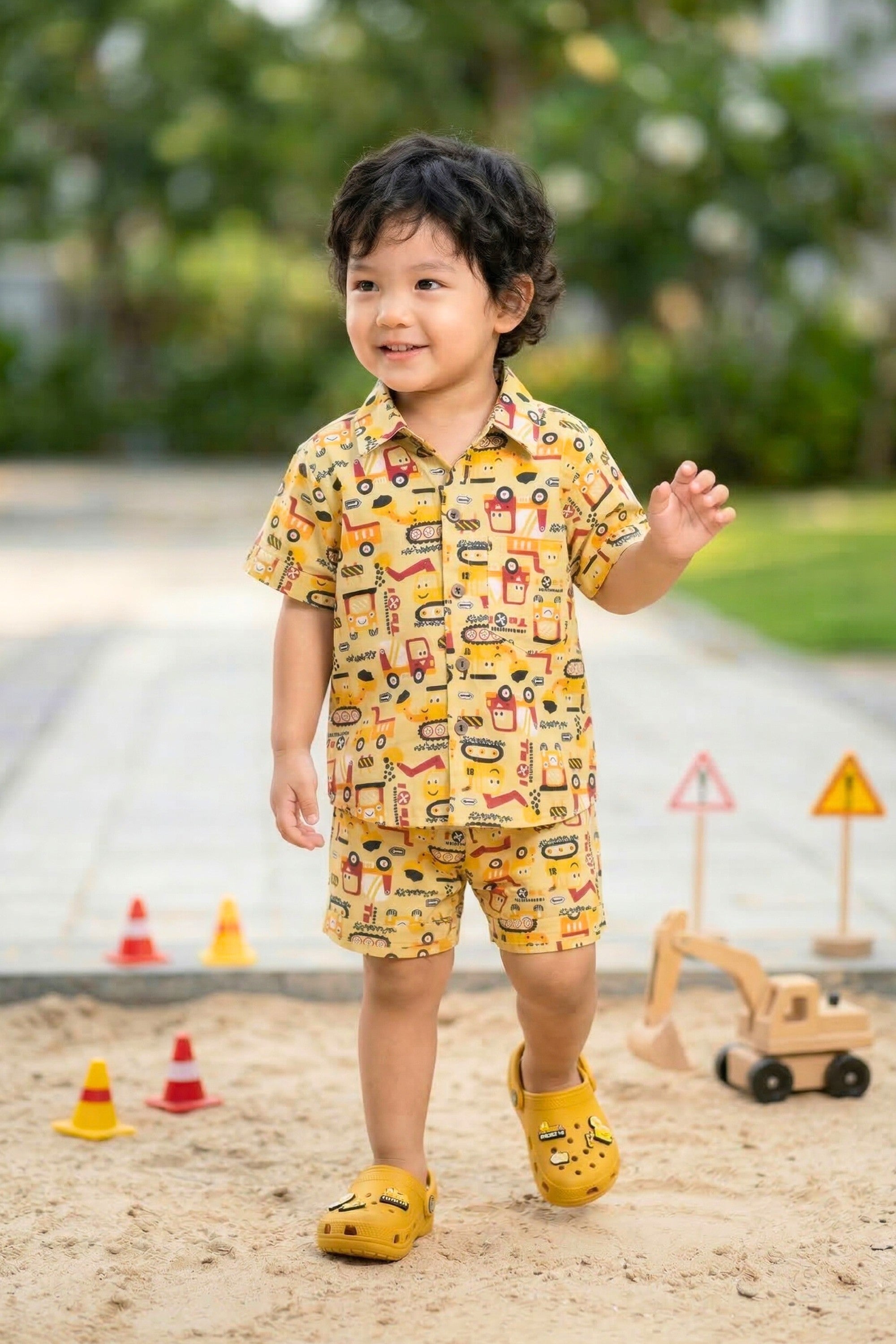 Boys JCB construction print shirt and shorts coord set flat lay — mustard yellow cotton kids clothing India