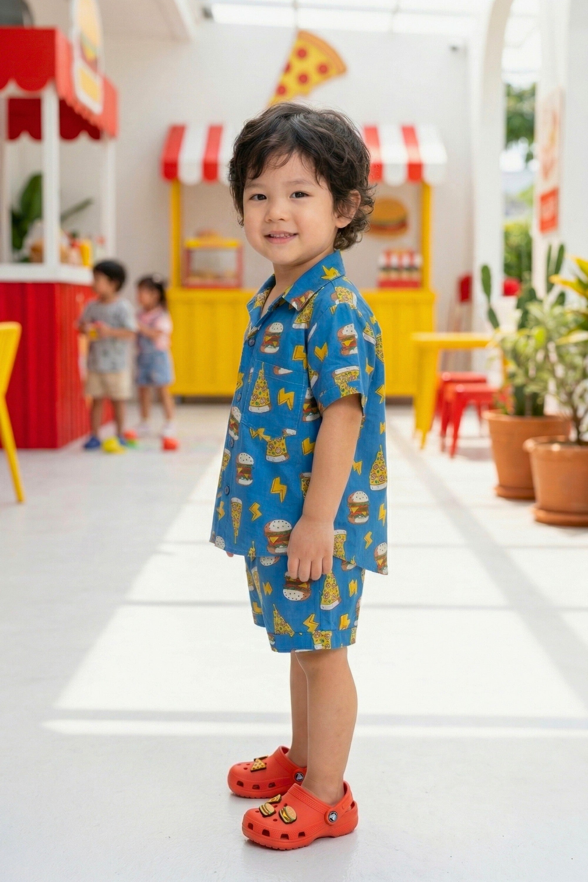 Flat lay of the Bebe Unicorn Boys Blue Fast Food Doodle Print 100% Cotton Coord Set — a boys birthday outfit suitable for daily wear, summer outings and gifting. Priced at ₹699, made in India, available in sizes 2–8 years.