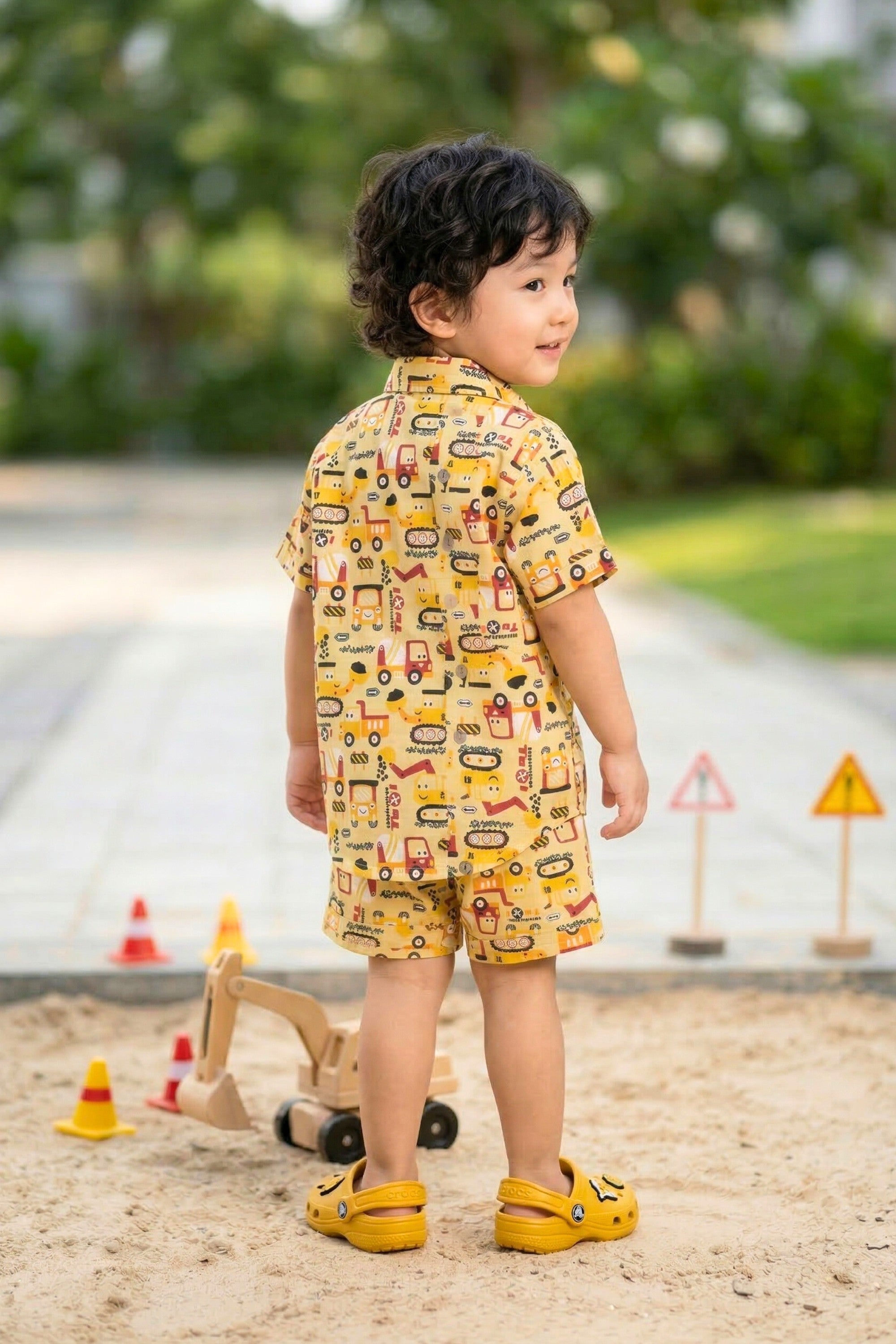 Coconut shell buttons on boys mustard yellow construction print cotton shirt — eco-friendly coord set Bebe Unicorn