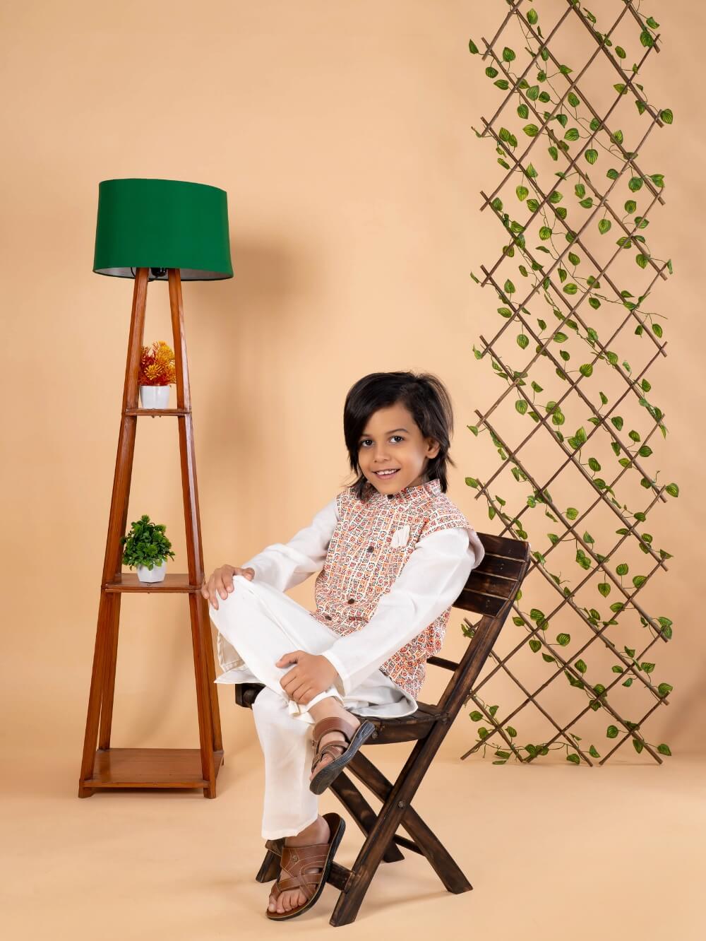 Bohemian Chic: Boys' Nehru Jacket with Off-White Kurta Pyjama Set