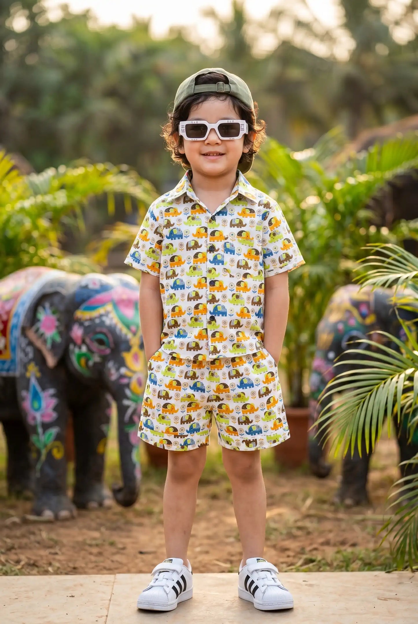 Boys elephant shirt showing chest pocket detail, colorful elephant print, button-down casual style for kids school wear & birthday gifts, age 2-8 years