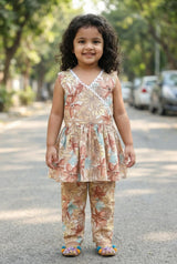 Girl wearing cream floral peplum coord set with lace trim – 100% cotton girls outfit 2–8 years India