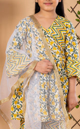 Diwali ethnic wear for girls in yellow floral sibling set (Rakhi) with kurta, palazzo, and net dupatta, perfect for festive celebrations.