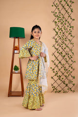Diwali ethnic wear for girls in yellow floral sibling set (Rakhi) with kurta, palazzo, and net dupatta, perfect for festive celebrations.