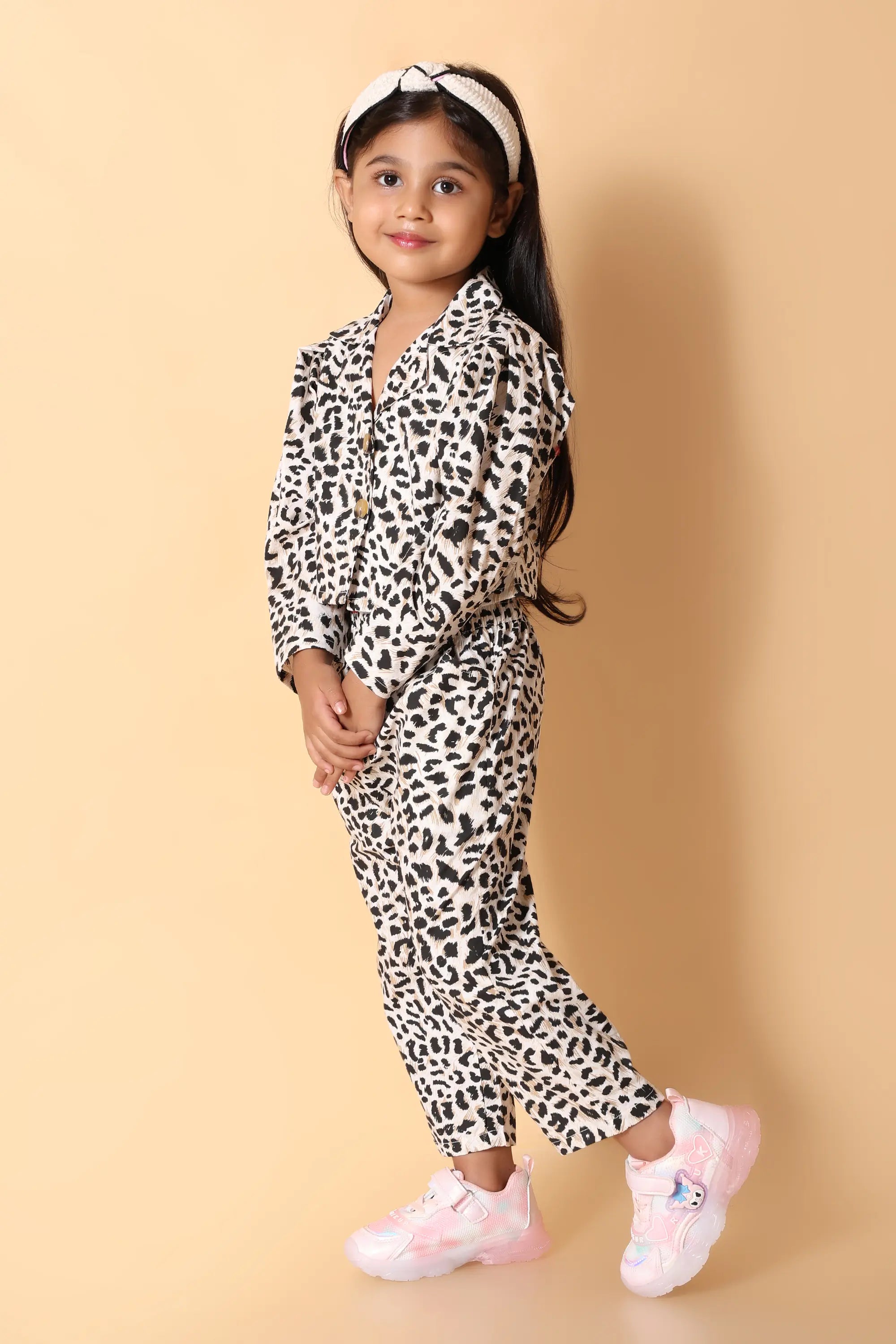 Front view – animal print girls co-ords with elastic waist trousers