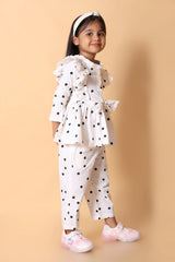 Front view – girls polka top and trouser set, classic black dot print