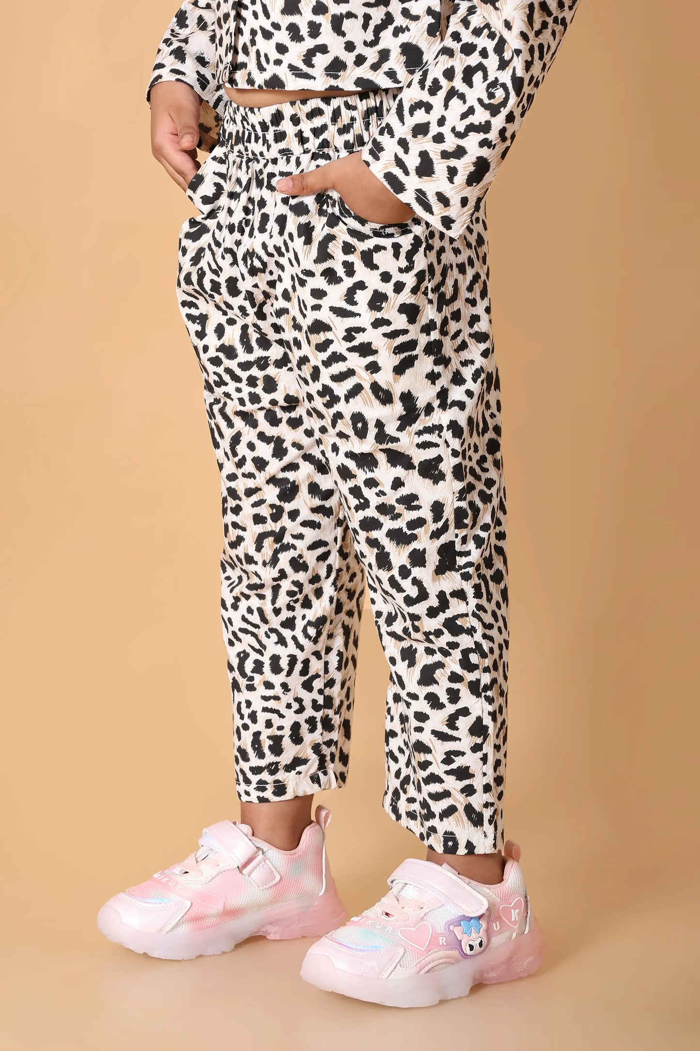 Lifestyle pose – party wear girls leopard co-ord set, ages 2–8