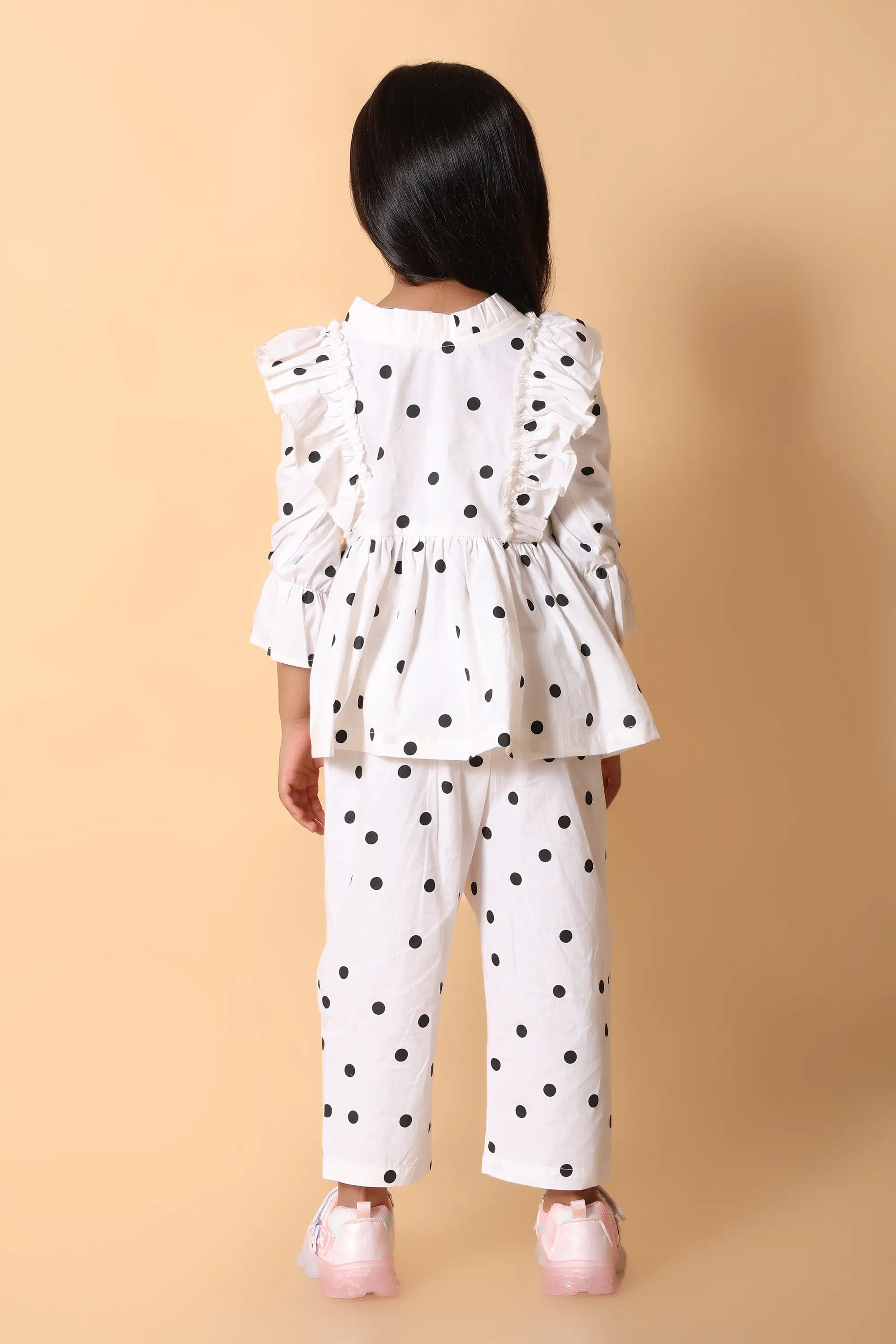 Side view – comfy elastic waist pants with dotted peplum top for girls