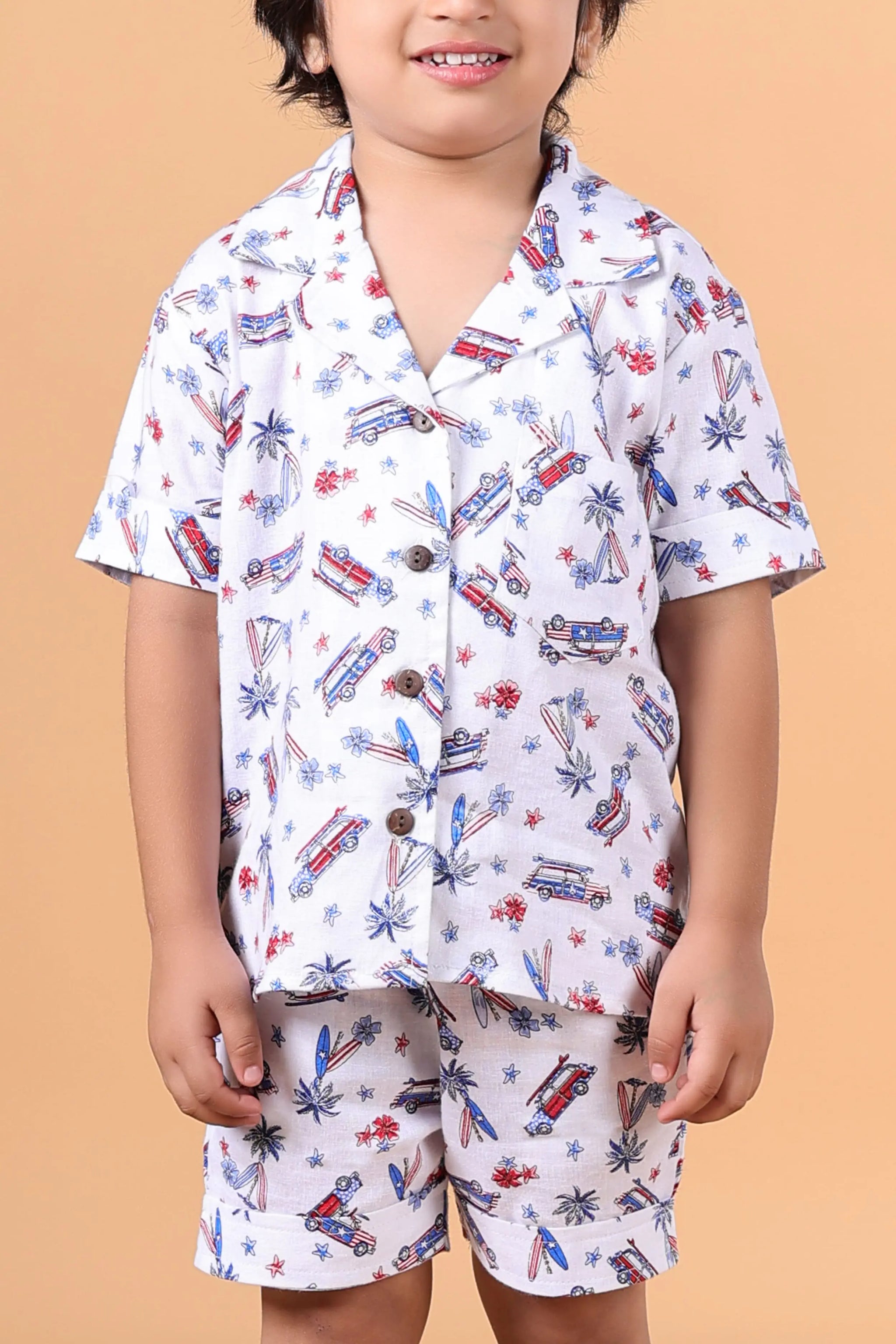 Side view – boys white linen shirt & shorts co-ords with pockets