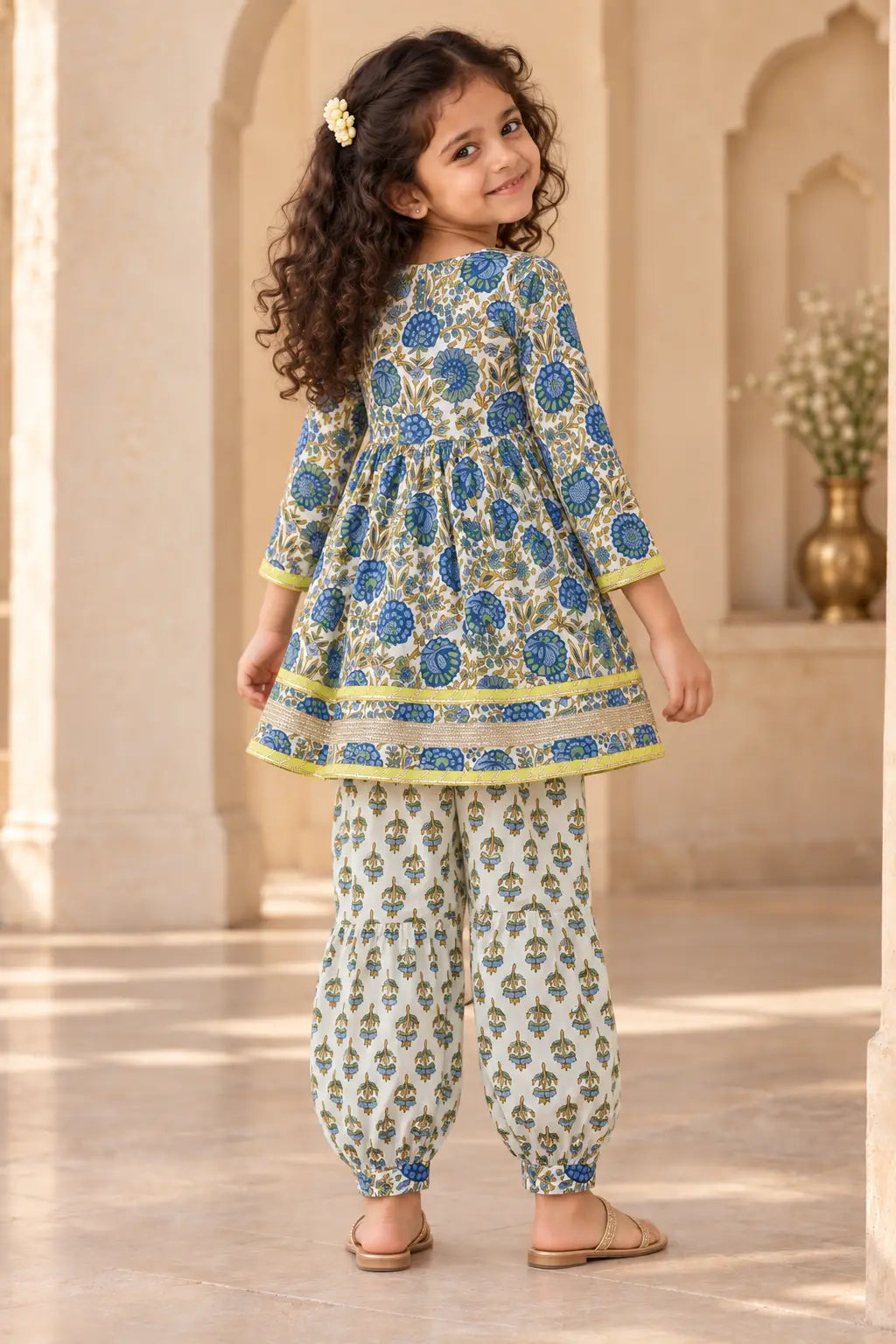 Back view of girls ivory blue floral kurti with gathered flare and afghani salwar – Bebe Unicorn