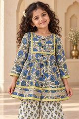 Close-up of girls floral kurti with lime green gota square yoke and button front – Bebe Unicorn