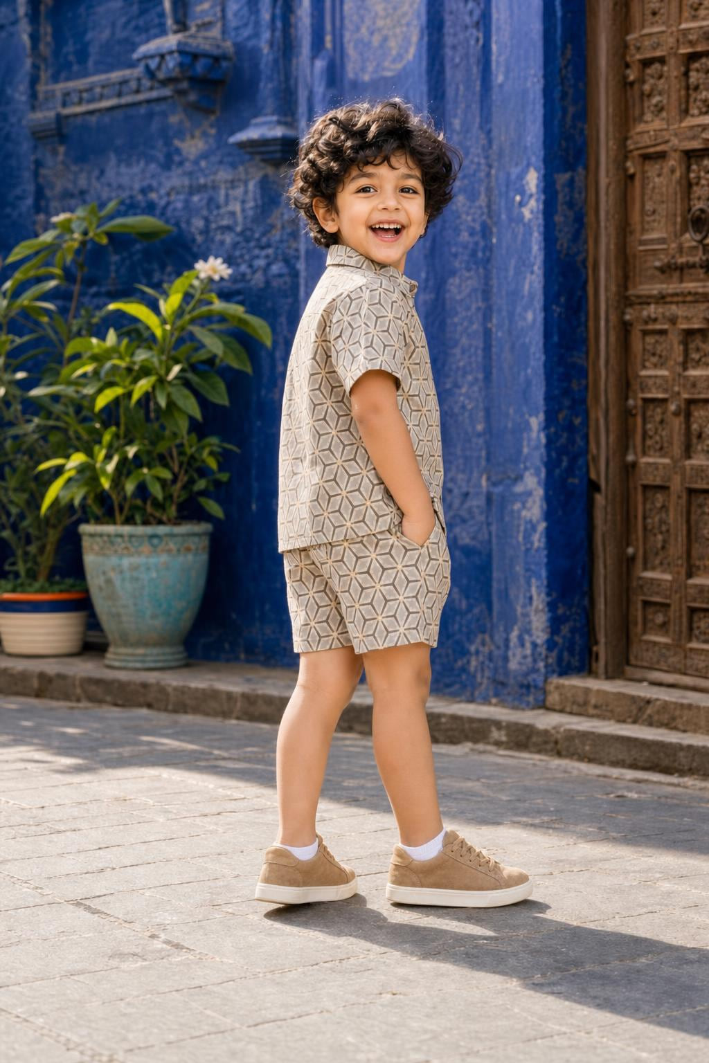 Side view of boys casual geometric print cotton coord set shirt and shorts