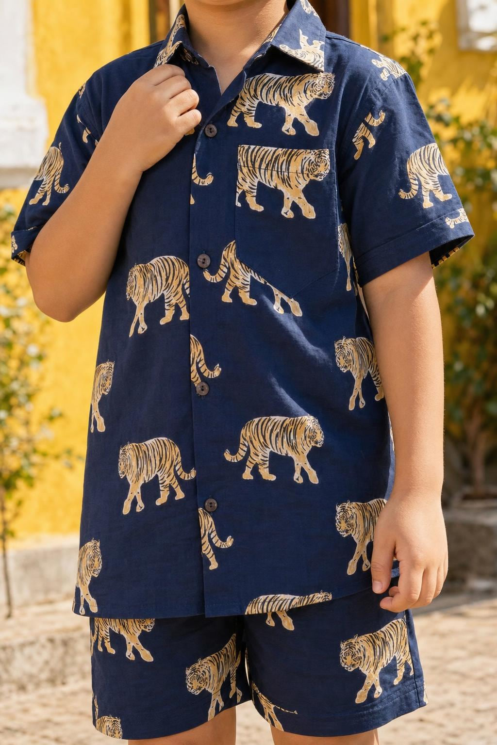 Close-up of boys navy bengal tiger print cotton coord set shirt print, collar and buttons