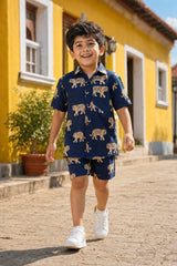 Boy wearing boys navy bengal tiger print cotton coord set with matching shorts, front view