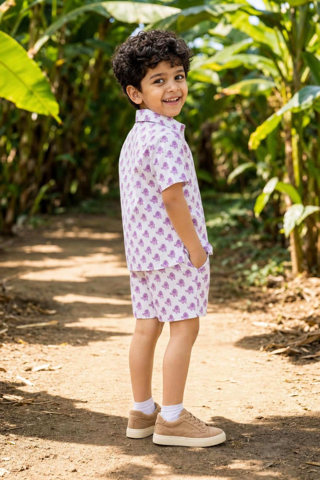 Side view of boys purple printed cotton coord set shirt and shorts