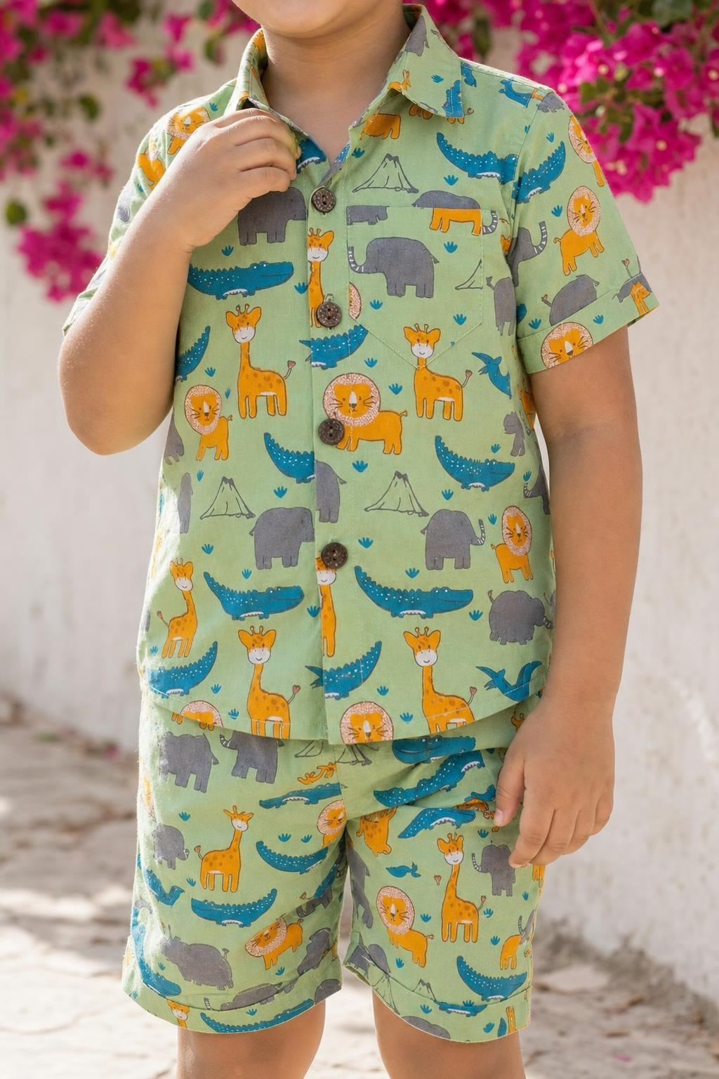 Close-up of boys safari animals print coord set shirt print, collar and buttons