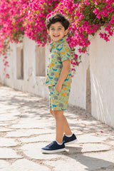 Side view of boys safari animals print coord set shirt and shorts