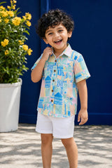 Close-up of boys multicolor print linen shirt with collar and buttons
