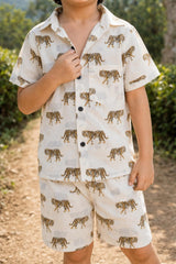 Close-up of boys tiger print coord set shirt print, collar and buttons