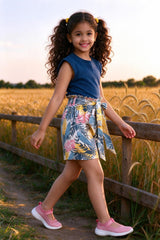 Side view of girls air force blue top & floral shorts set
