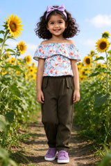 Girl wearing girls floral off-shoulder ruffle top & olive pants set, front view