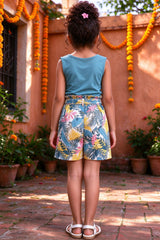 Back view of girls teal top & floral shorts set