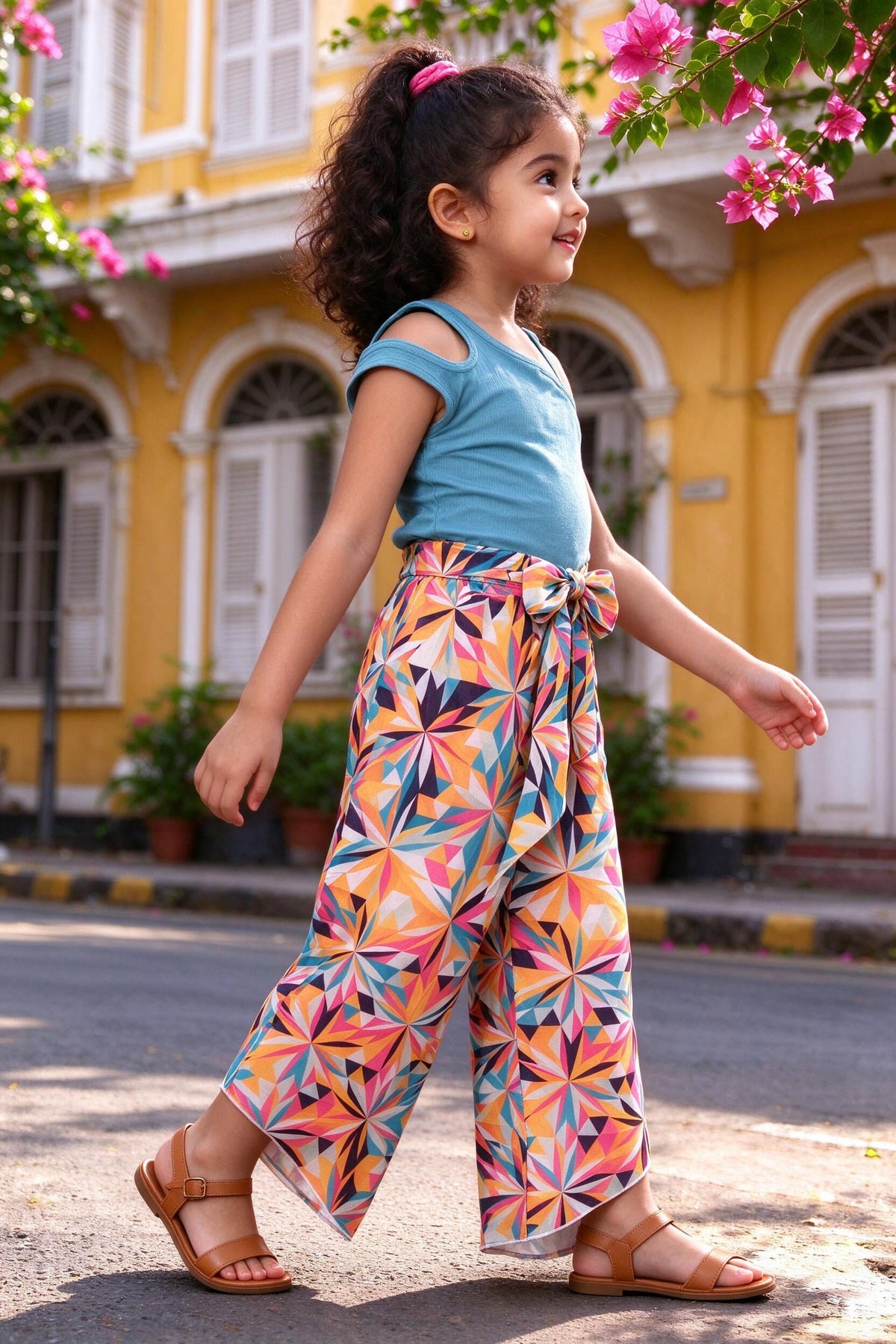 Side view of girls teal top & multicolour palazzo set