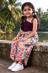 Girl wearing girls wine rib top & multicolour geometric print palazzo set, front view