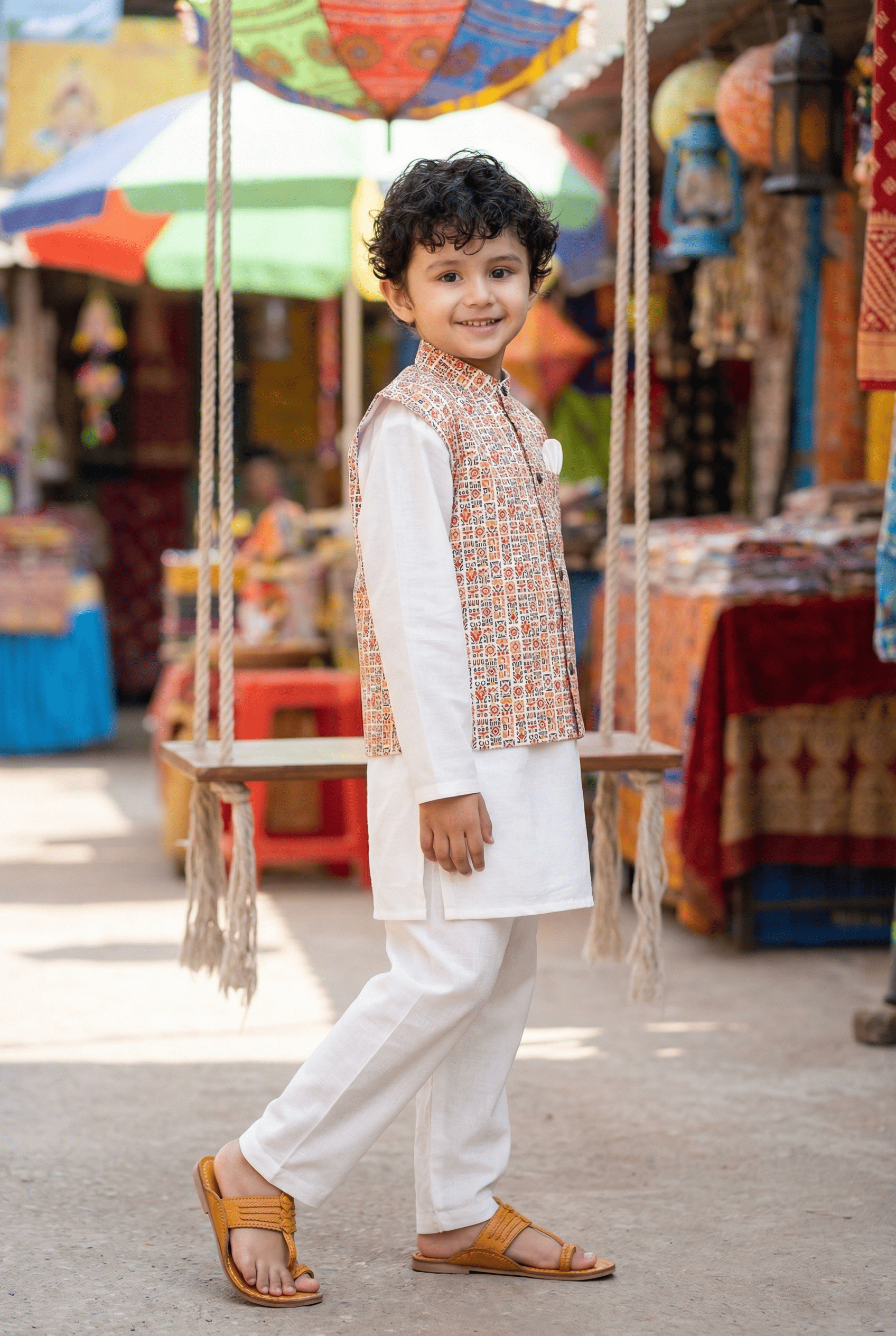Bohemian Chic: Boys' Nehru Jacket with Off-White Kurta Pyjama Set